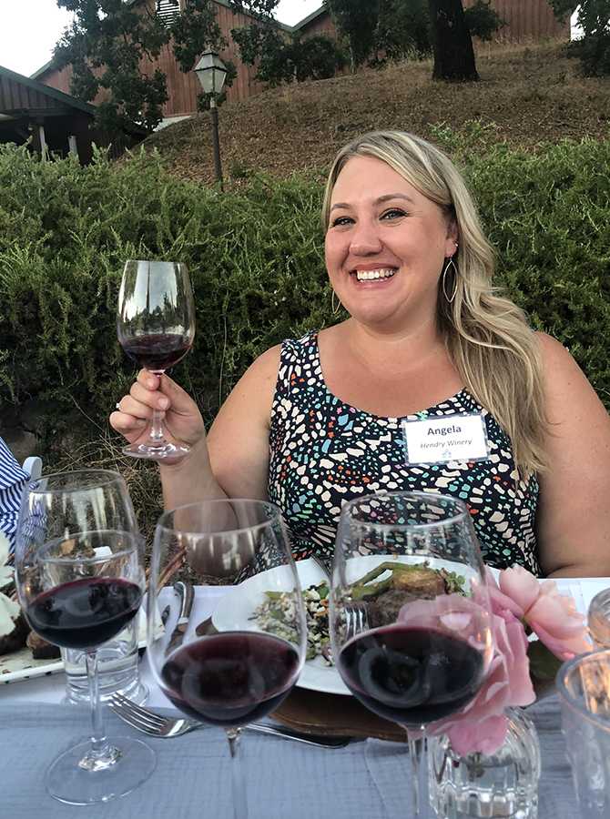 Angela Douglass on the porch of the winery