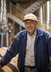 Raffa Melgoza, Hendry's Cellar Master in the winery with barrels